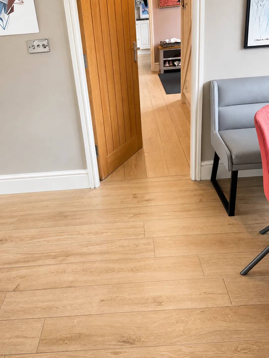Laminate hallway floor after professional hard floor cleaning.